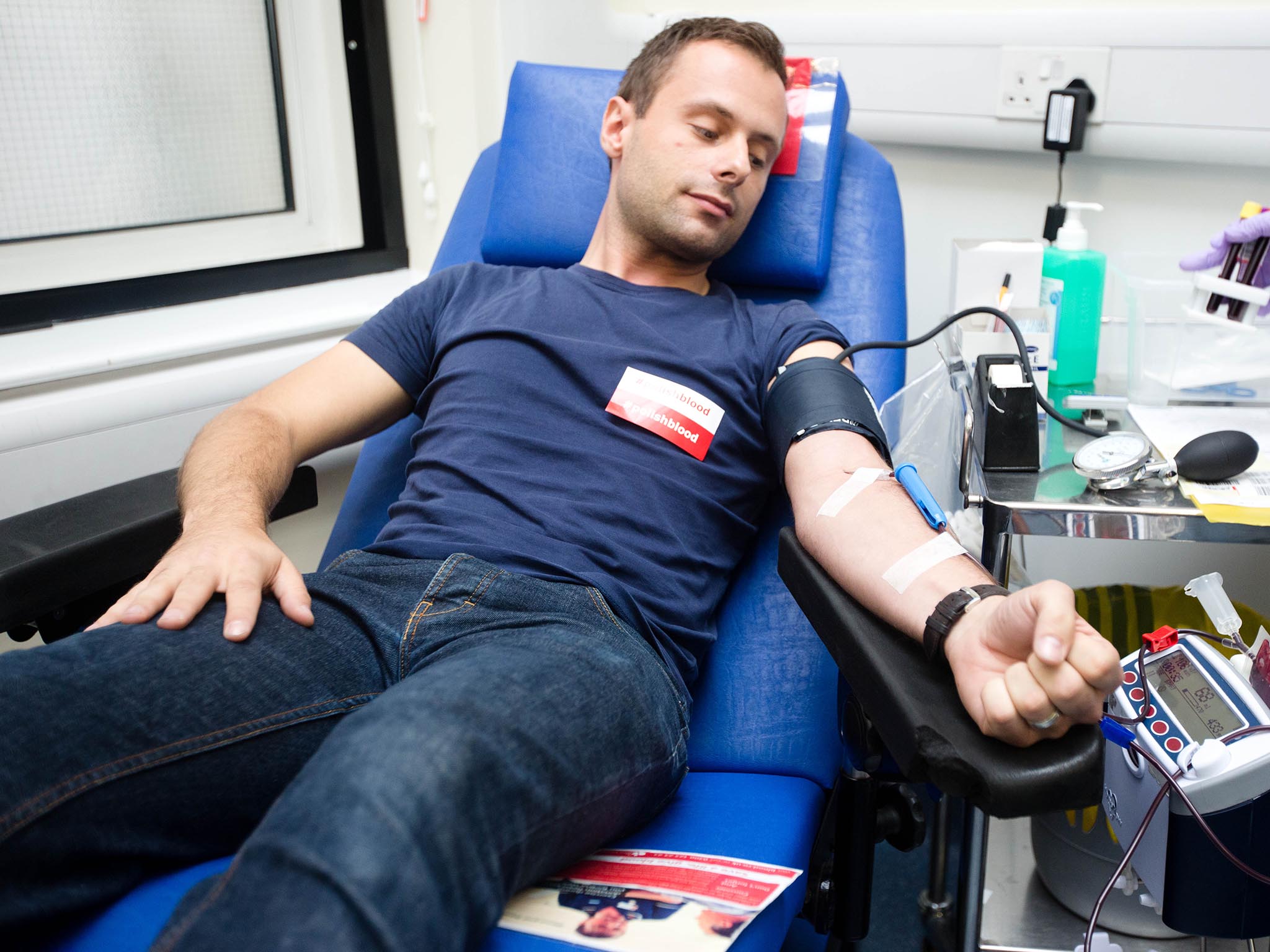 Michael Kowalski giving blood.