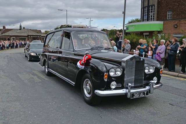 The funeral cortege of Cilla Black leaves B Jenkins and Son as it makes its way to St Mary's RC Church (Getty)