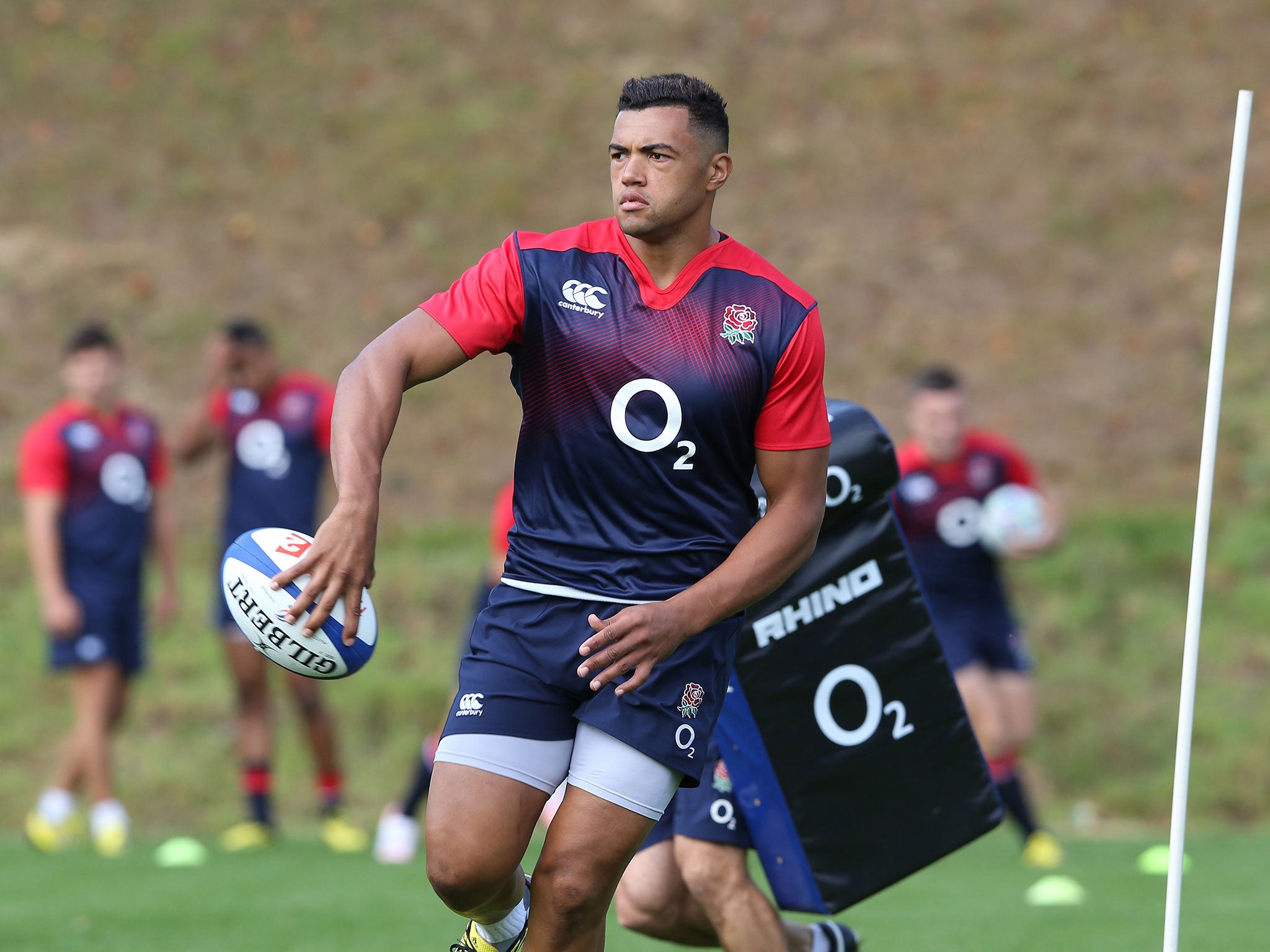 Luther Burrell gets on the ball during England training at Pennyhill Park yesterday