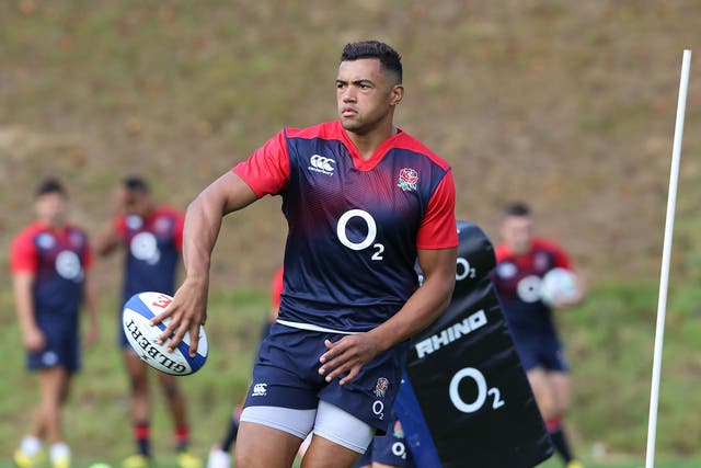 Luther Burrell gets on the ball during England training at Pennyhill Park yesterday