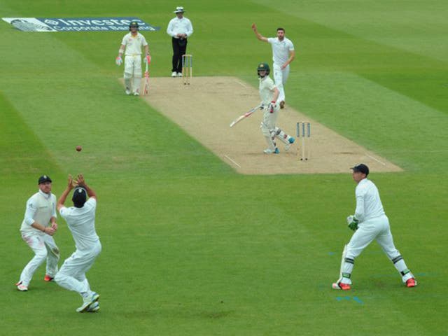 Alastair Cook juggles with the ball before catching Chris Rogers
