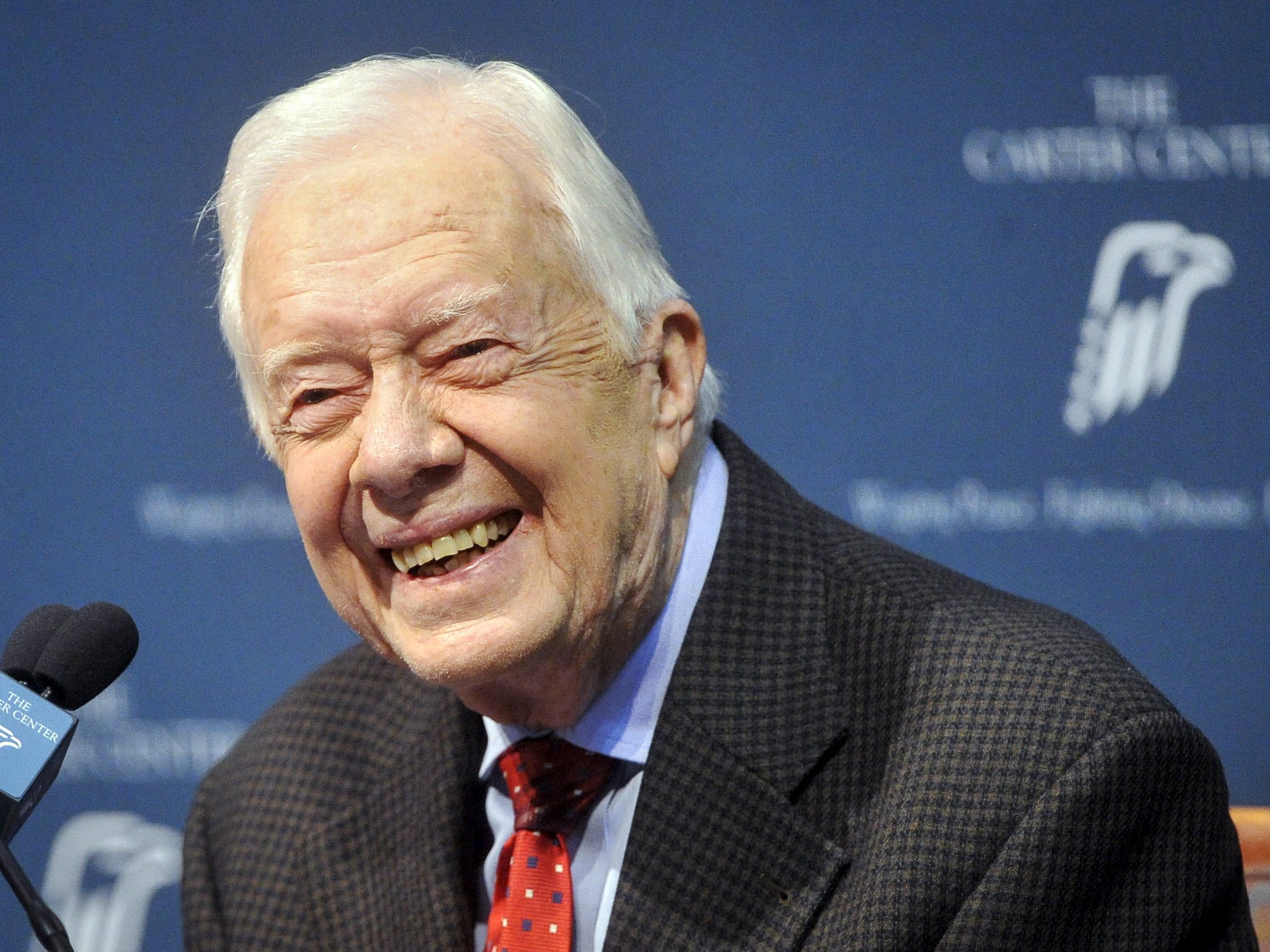 Former U.S. President Jimmy Carter takes questions from the media during a news conference about his recent cancer diagnosis and treatment plans
