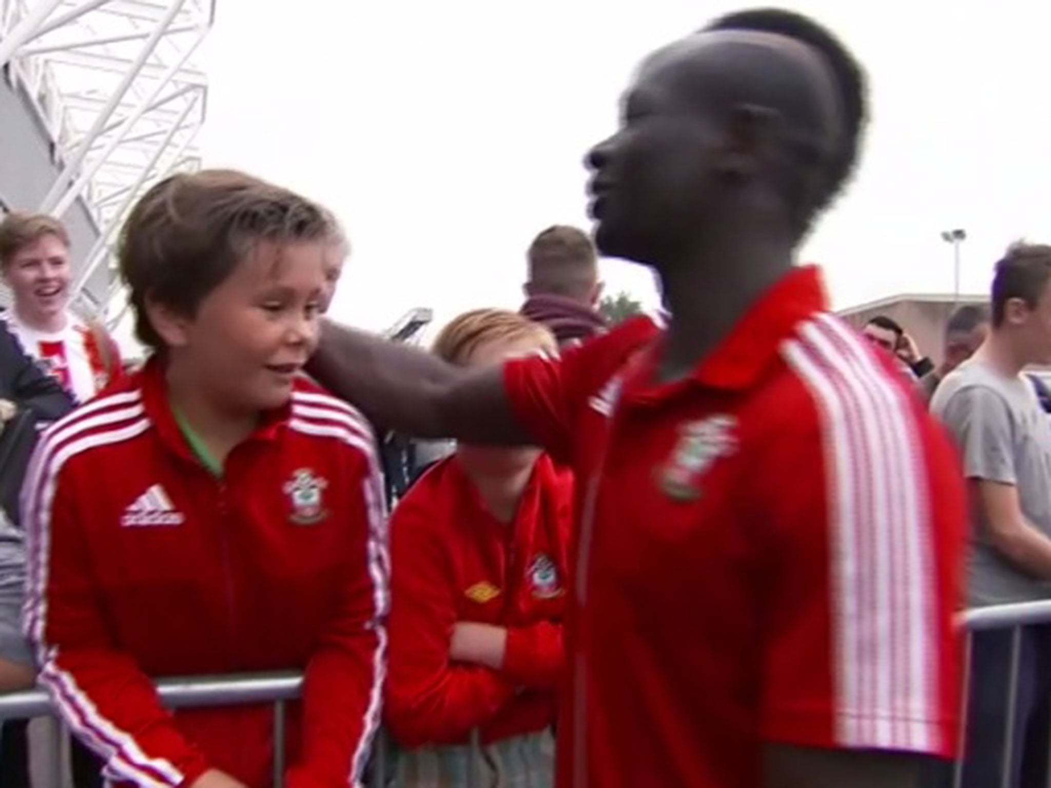 Sadio Mane speaks with the young fan