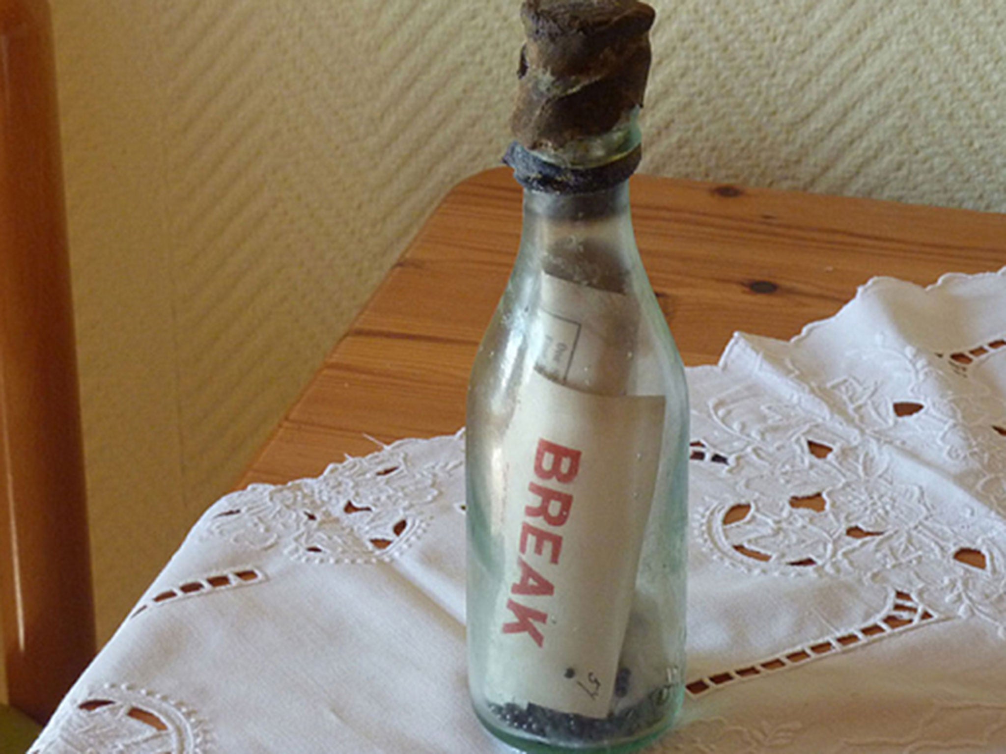 The couple smashed open the bottle to retrieve the note