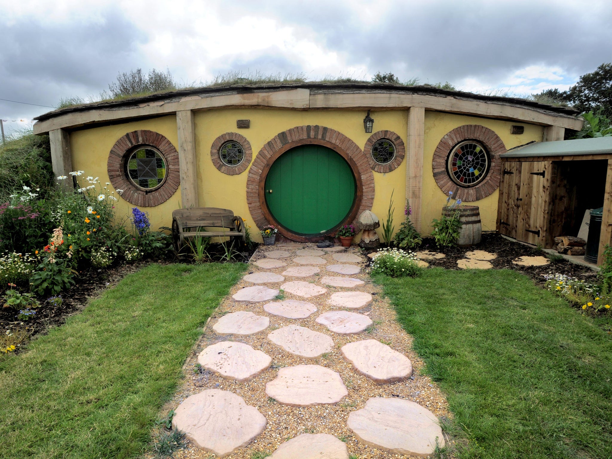 The outside of the "Hobbit House" at Golden Hill Farm