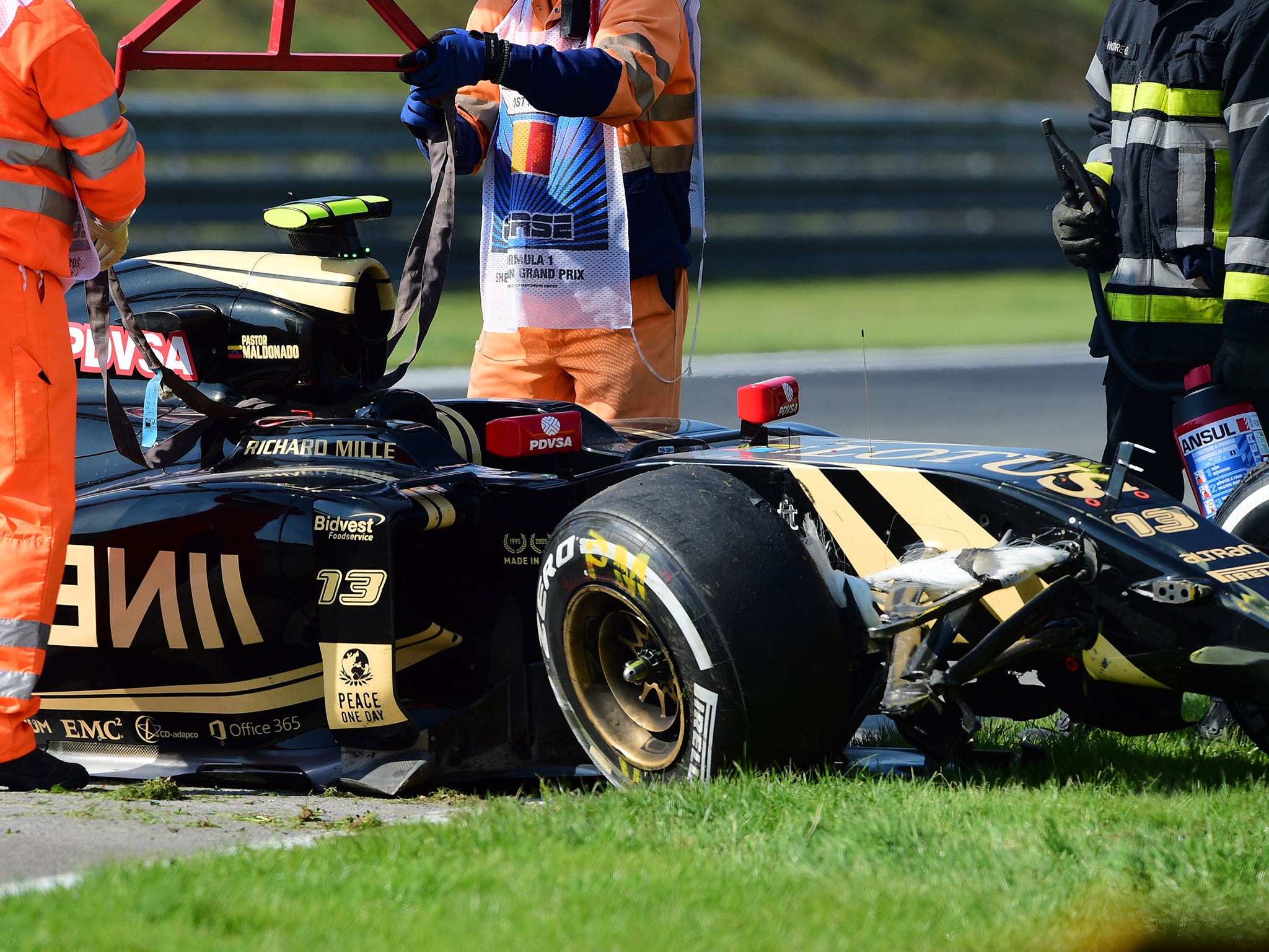 Maldonado's Lotus suffered damage to the front and rear