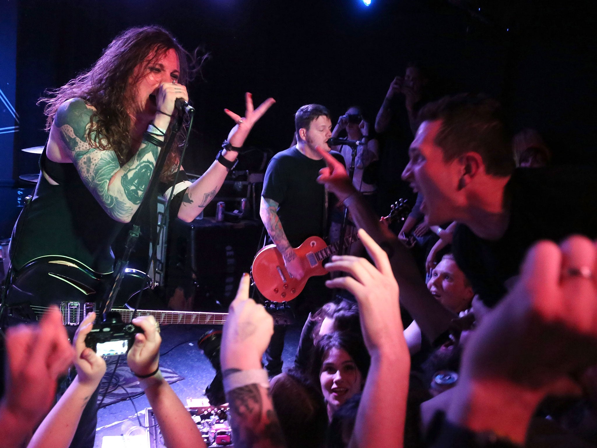 Laura Jane Grace performing with Against Me! in Brooklyn, May 2014 (Getty)