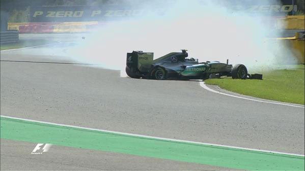 Nico Rosberg's right-rear tyre suddenly explodes on the run to Blanchimont