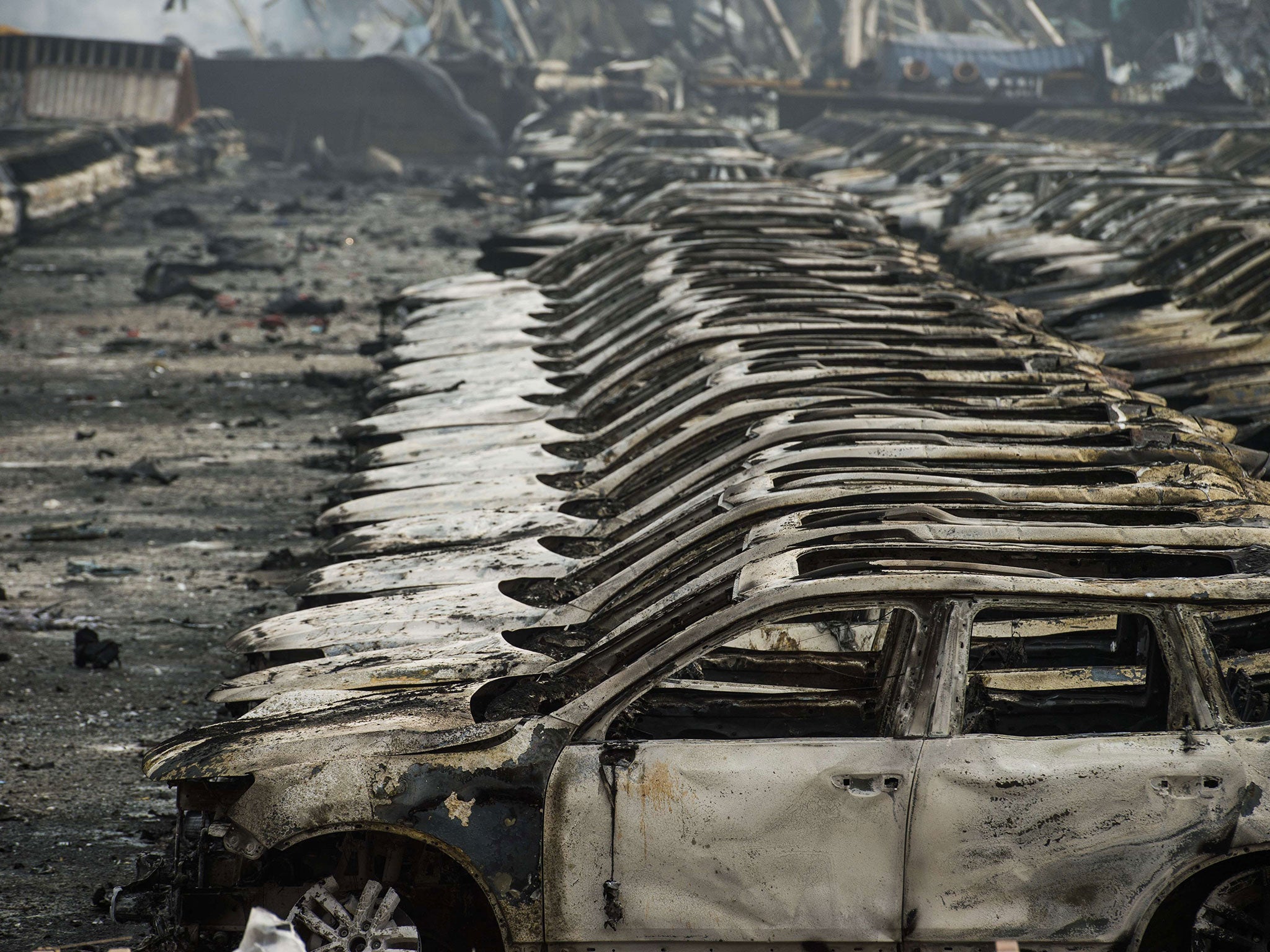 Rows of burnt out Volkswagen cars following the explosion