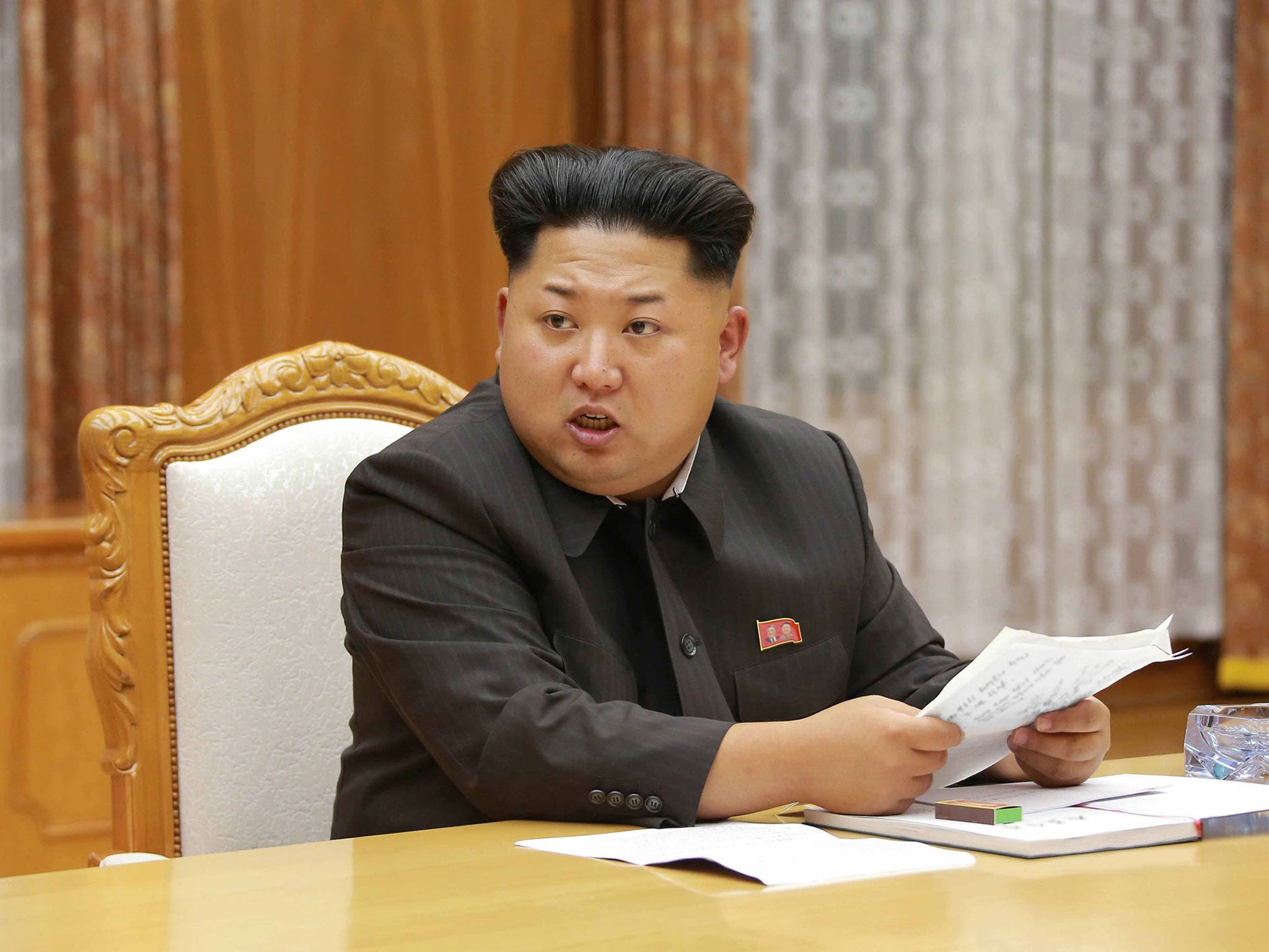 North Korean leader Kim Jong-Un attending an emergency meeting of the Workers' Party of Korea