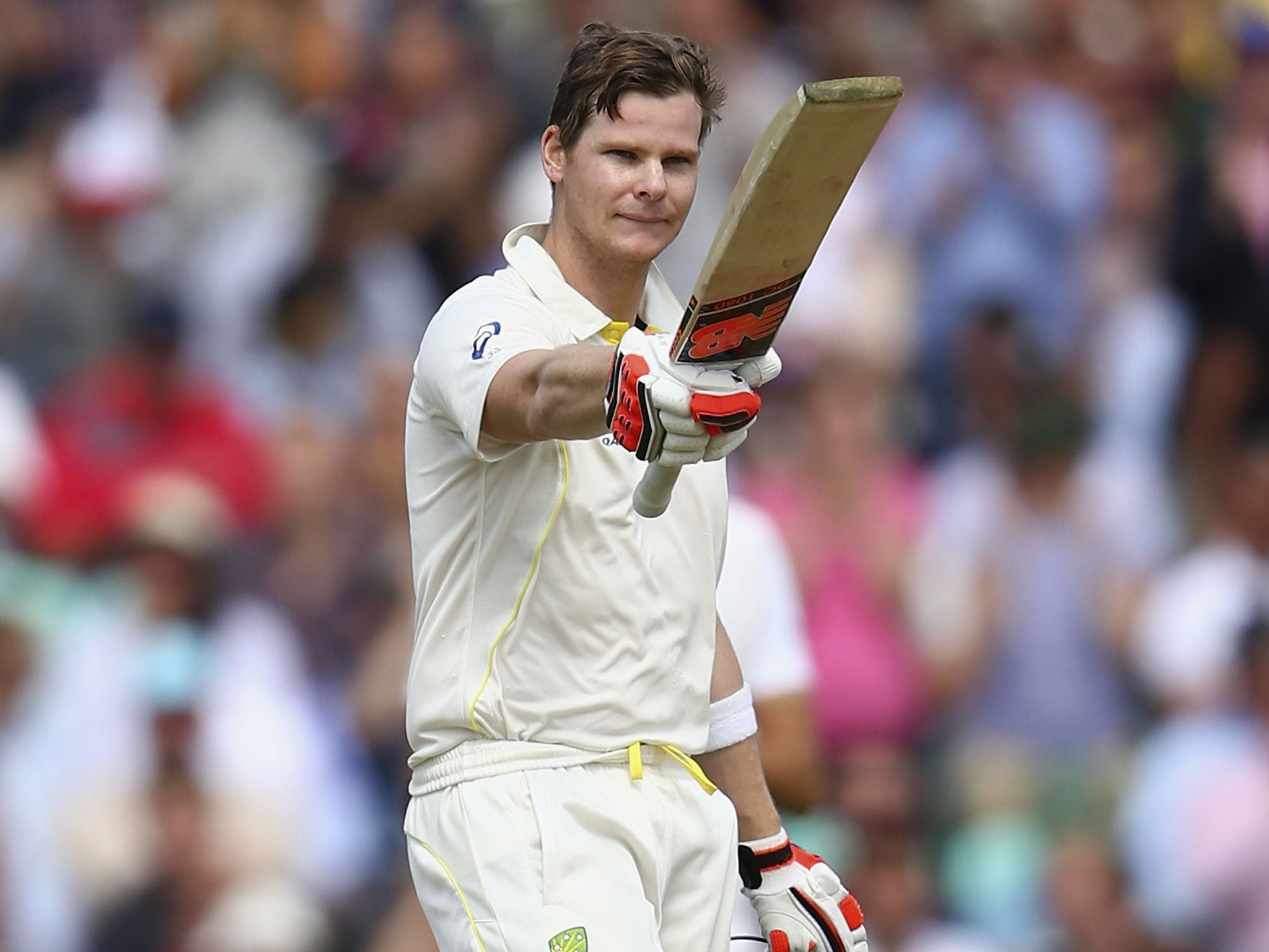 Steve Smith salutes reaching three figures in modest fashion
