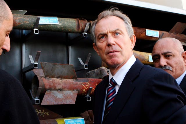 Tony Blair looks at exploded rockets on display in the Israeli town of Sderot in 2009 after his first visit to Gaza. The former Prime Minister has met Hamas representatives in the past three months 