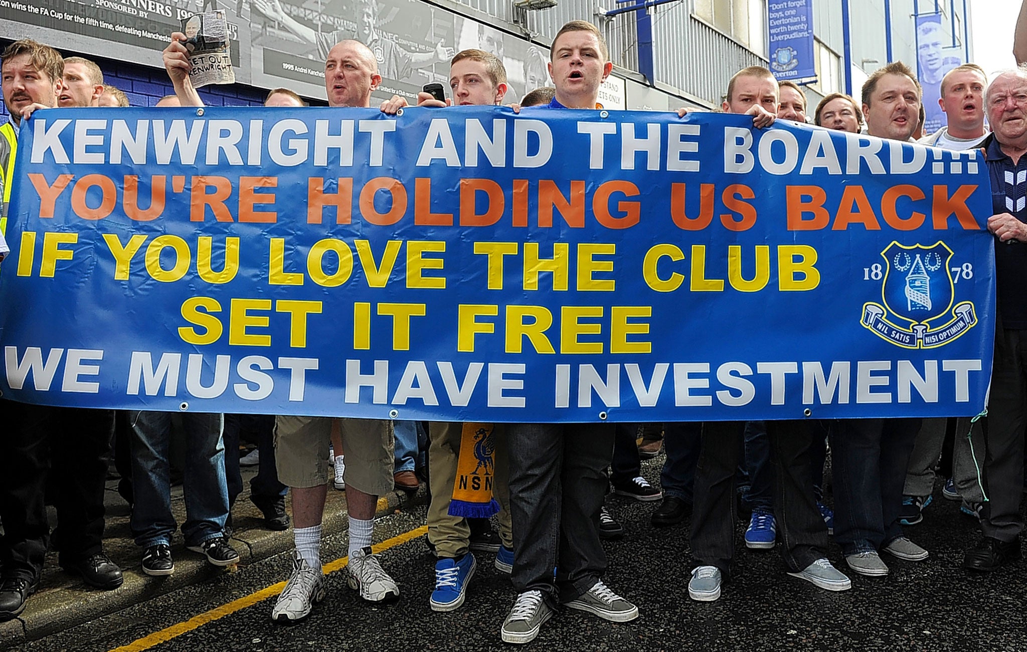 Everton fans protest against chairman Bill Kenwright at Goodison Park during the 2011-12 season