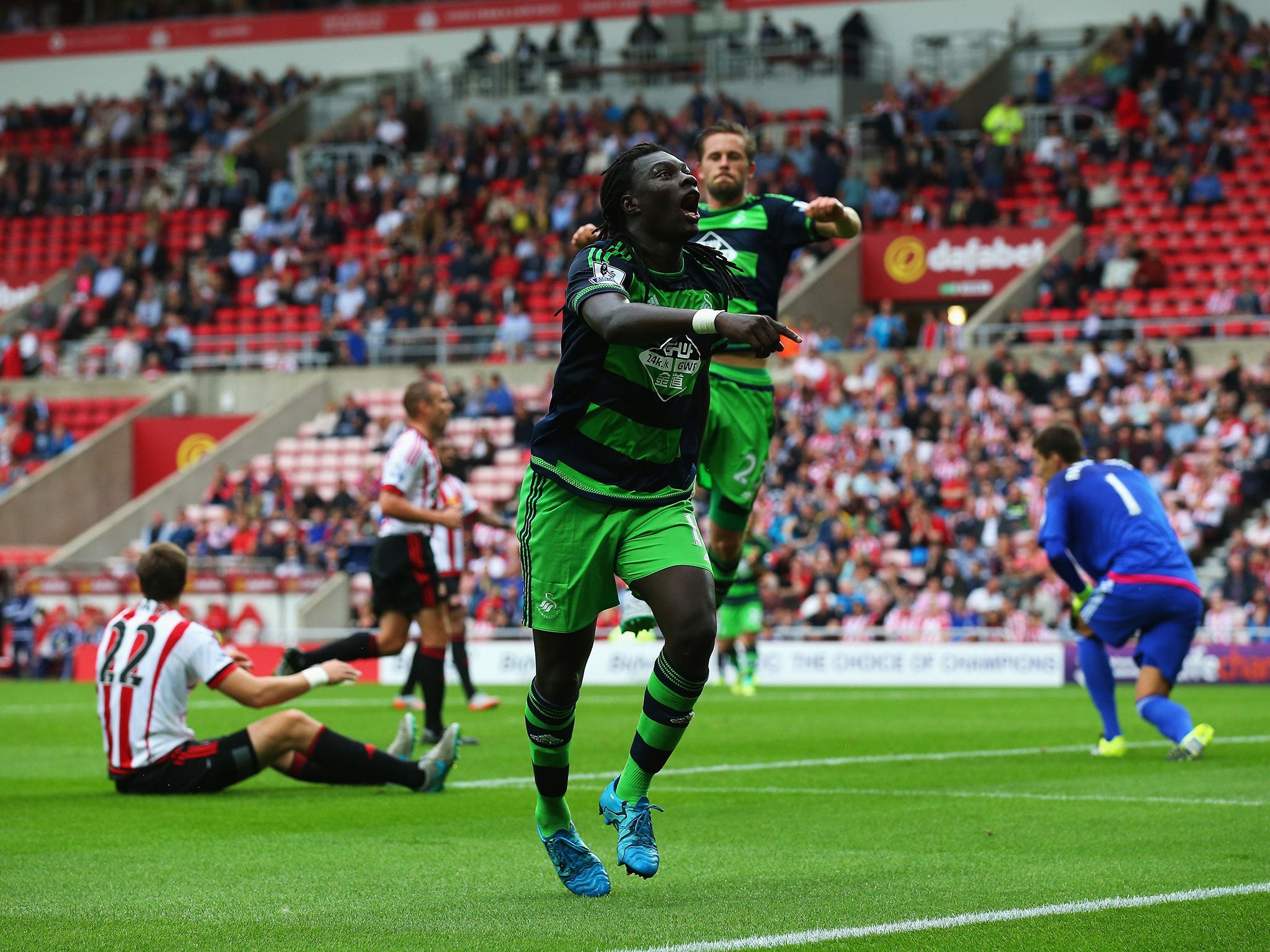 Bafetimbi Gomis celebrates scoring the opener for Swansea against Sunderland