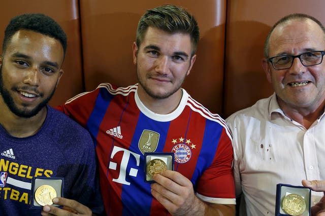  Anthony Sadler, Alek Skarlatos and Chris Norman with medals from the Mayor of Arras