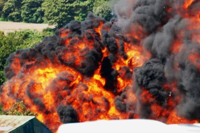 A huge fireball erupted after the jet crashed into the dual carriageway