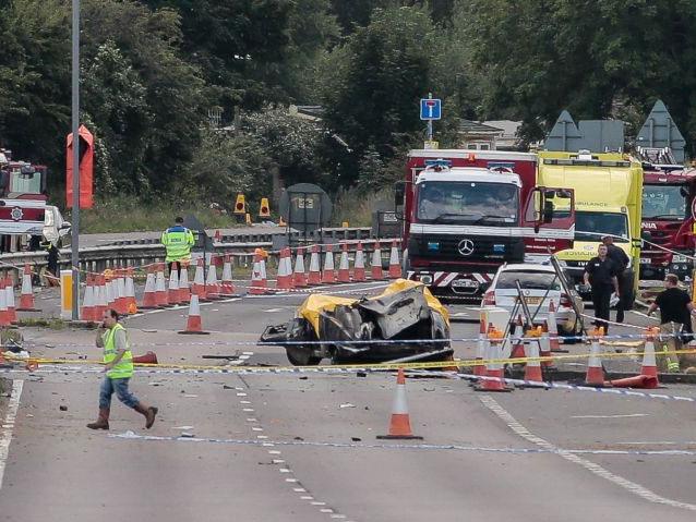 Emergency services attend the scene of the crash near the Shoreham Airshow grounds