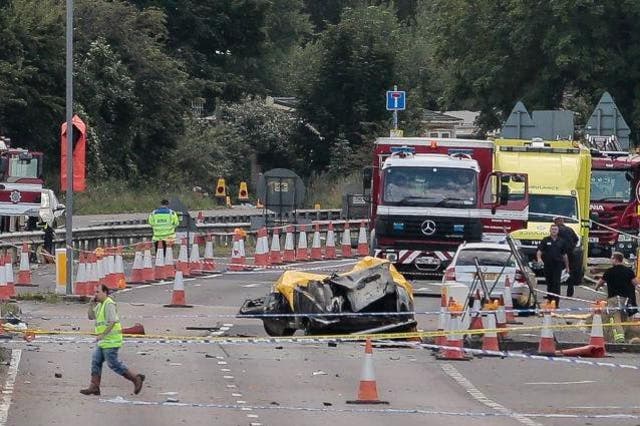 Emergency services attend the scene of the crash on the A27 in August 2015