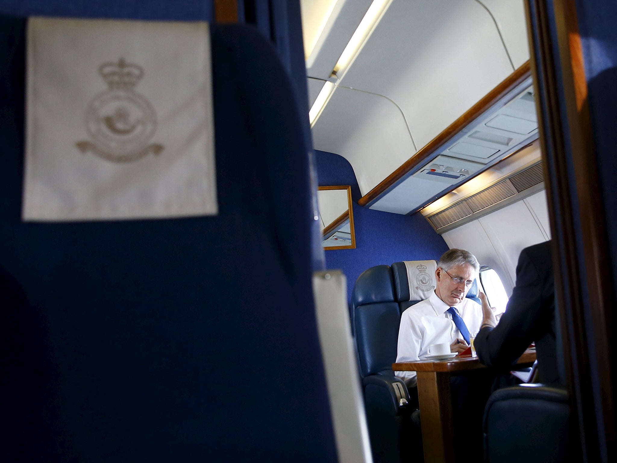Philip Hammond on the plane before landing in Tehran (Reuters)