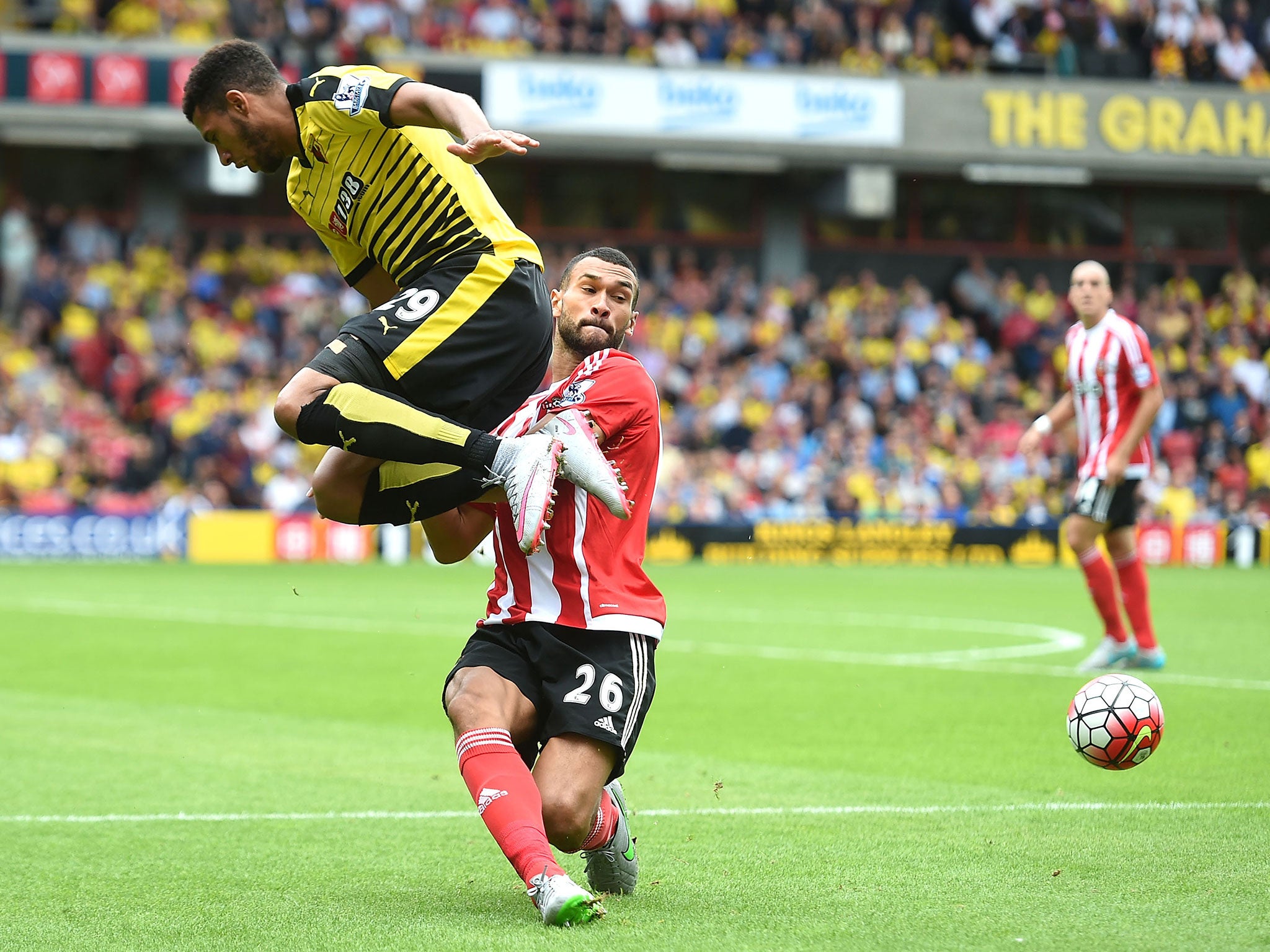 Etienne Capoue of Watford and Steven Caulker of Southampton batthe for the ball