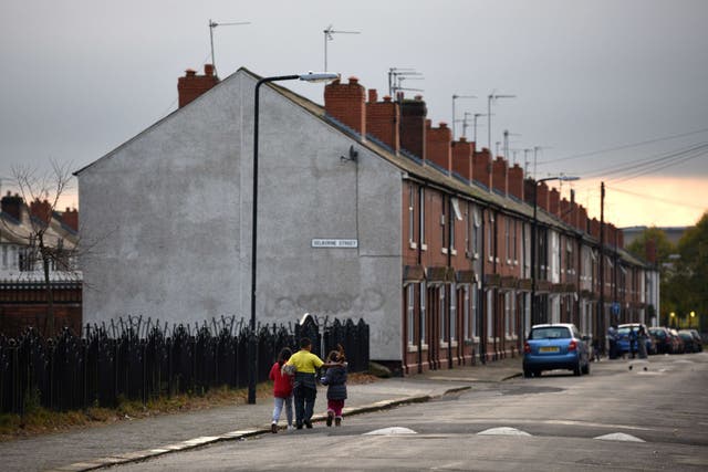 Children walk along a street in the Eastwood area of Rotherham, South Yorkshire,