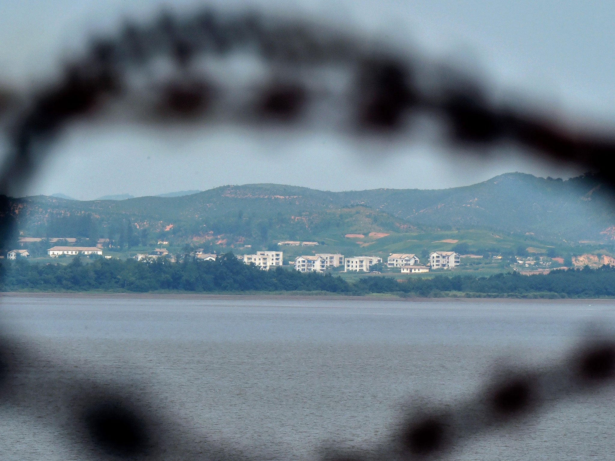 A view on the North Korean side of the Military Demarcation Line in the Demilitarized Zone (DMZ), seen from South Korea, on 24 August 2015