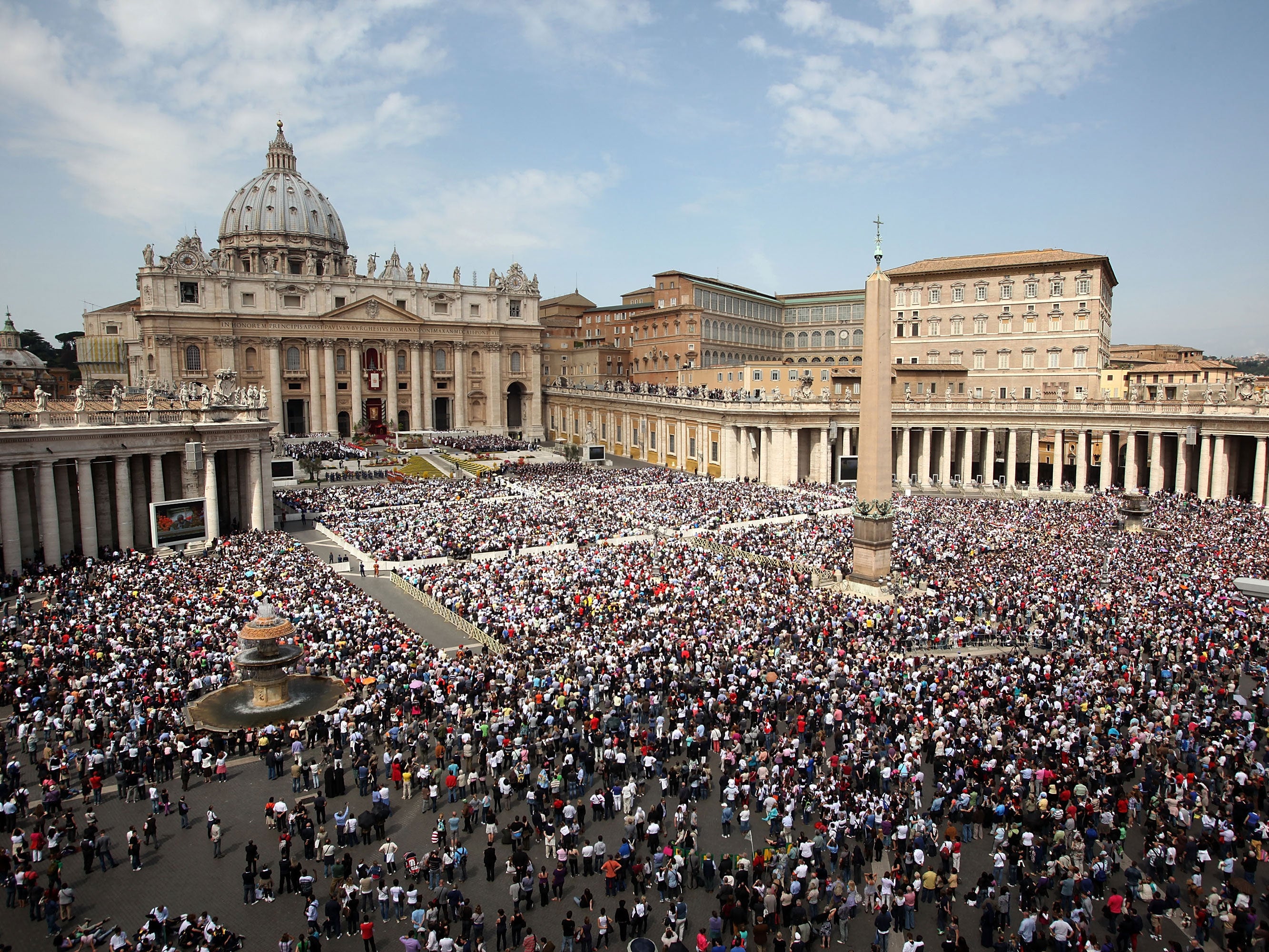 Catholics gather in St Peter's Square during Easter Mass