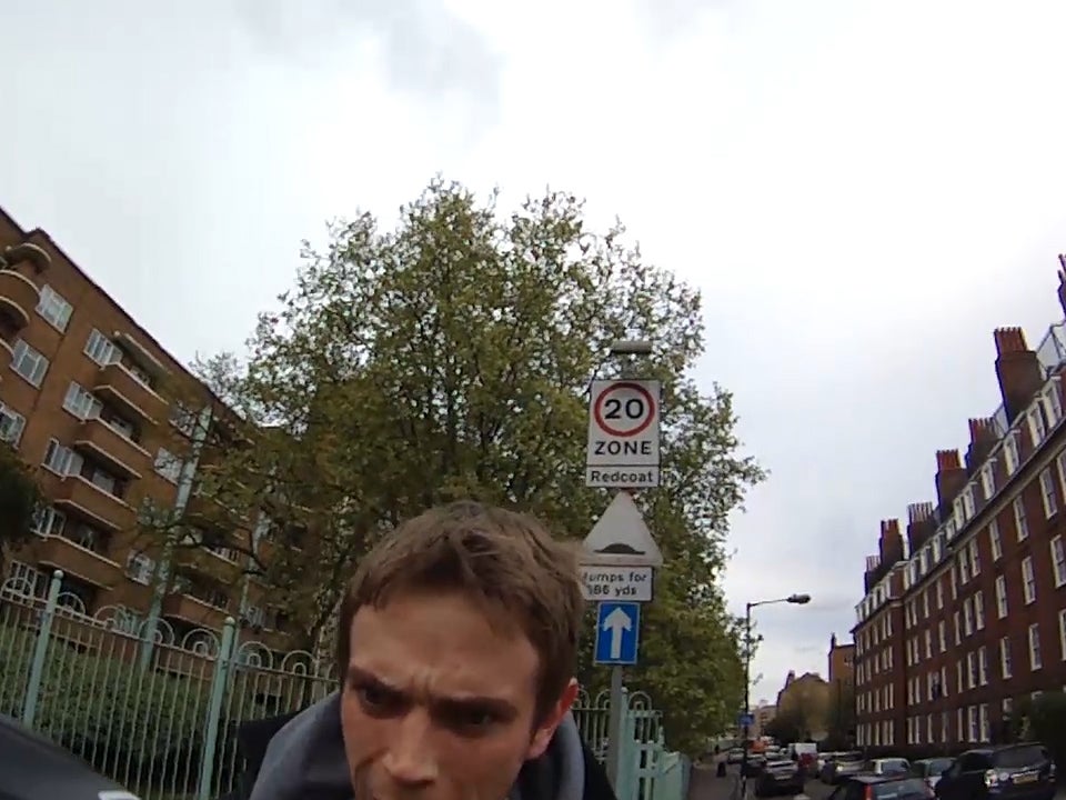 Man caught on camera pushing woman off bike during rush hour traffic in Whitechapel