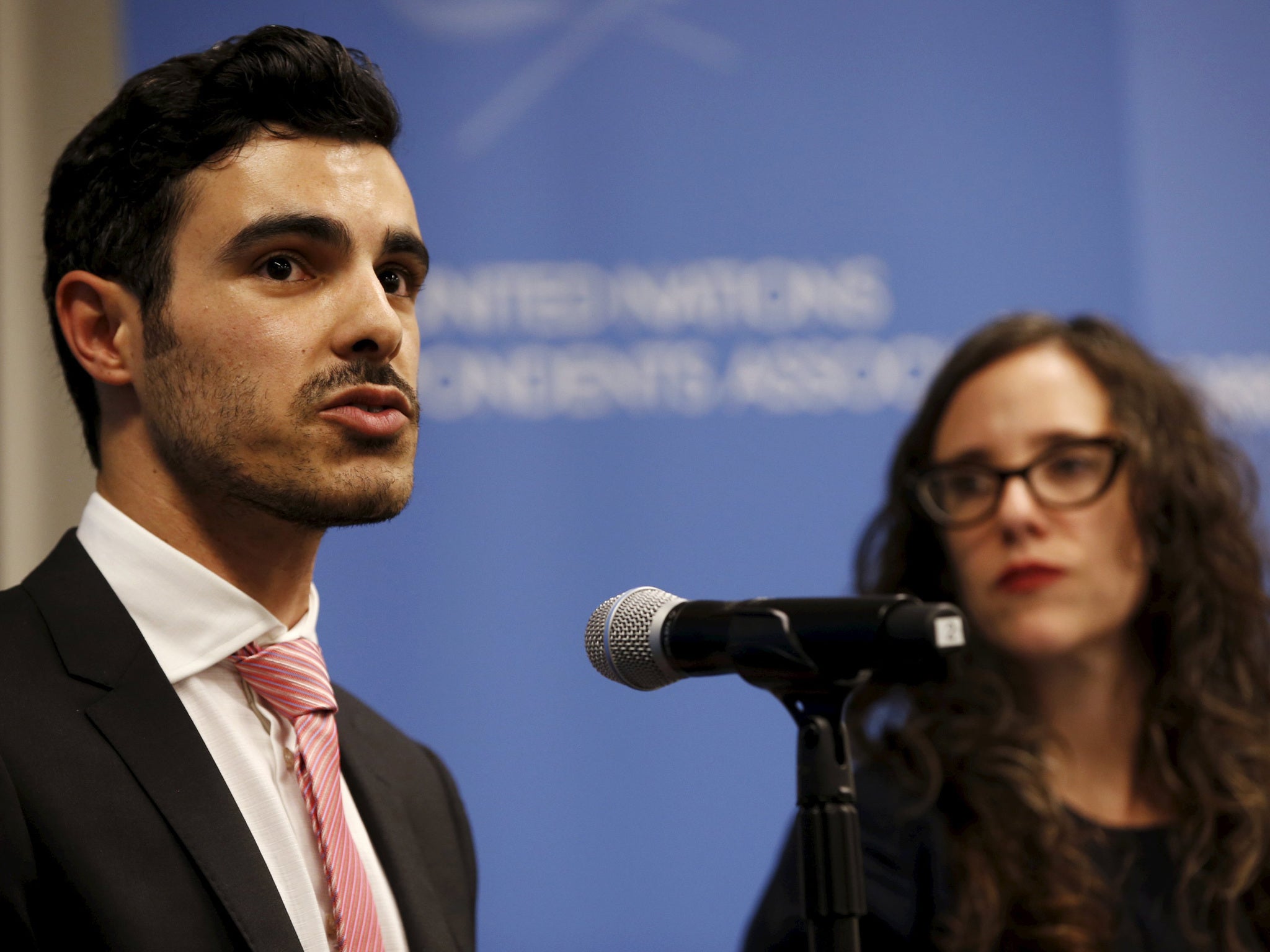 Gay Syrian refugee Subhi Nahas (L) speaks as Jessica Stern, Executive Director of the International Gay & Lesbian Human Rights Commission (R) looks on, at a news conference at the United Nations headquarters in New York,