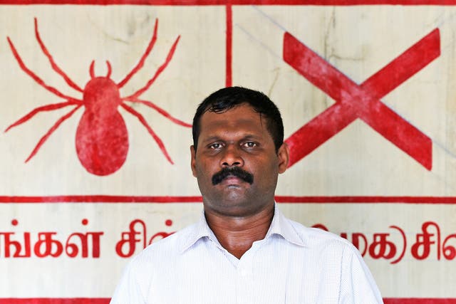 Sivanthan Navidra, aka Venthan, former Tamil Tiger and a Crusaders for Democracy candidate in Sri Lanka’s parliamentary election earlier this month, in front of the party symbol
