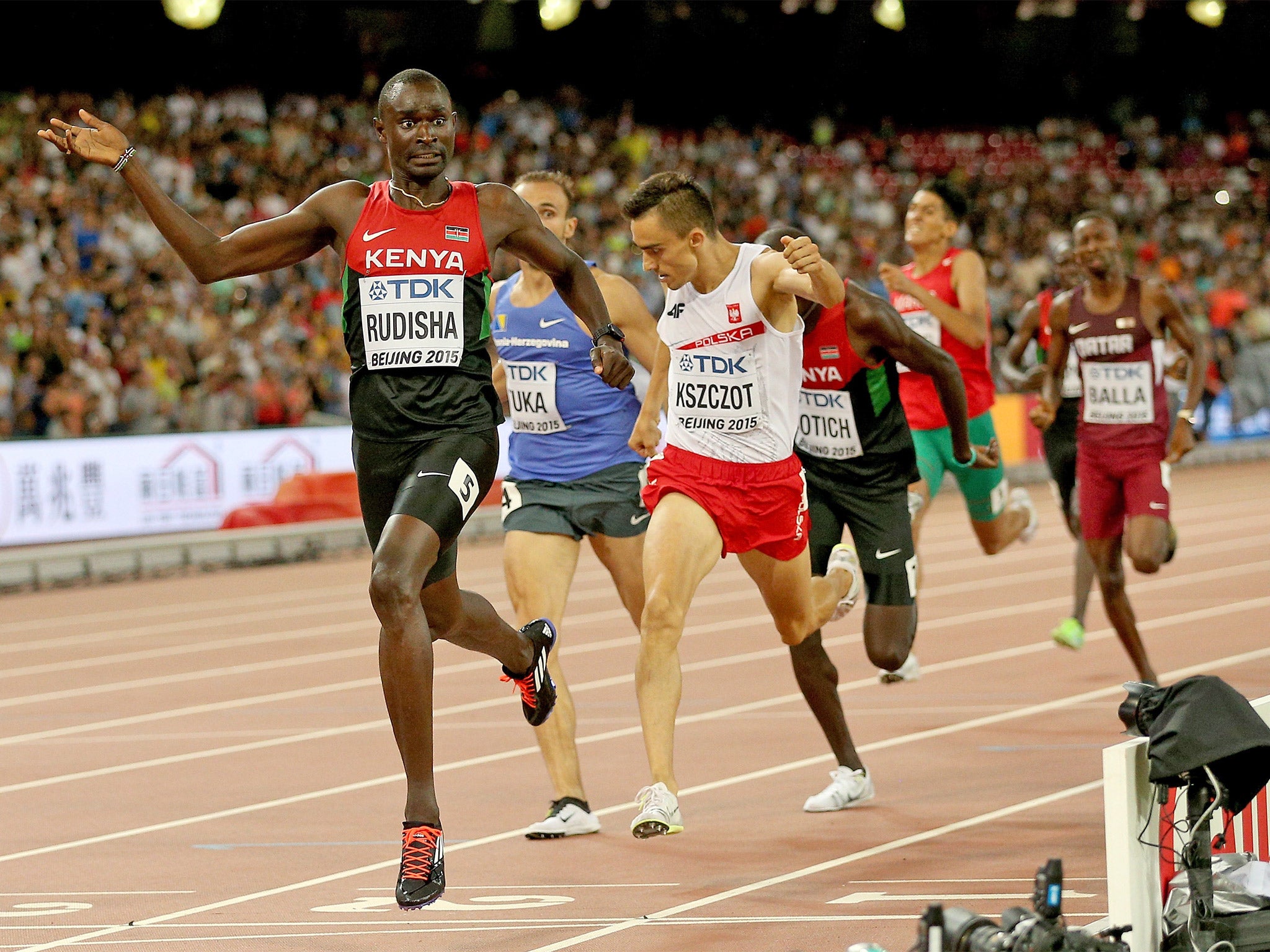 Kenya’s David Rudisha holds off a late charge from two of his rivals to win his second world title