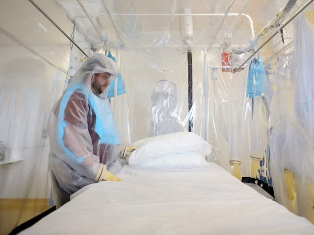 A nurse preparing facilities for a potential Ebola patient at the Royal Free Hospital in north London, last year