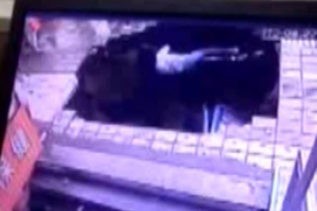 Sinkhole swallows four people at China bus stop in CCTV video