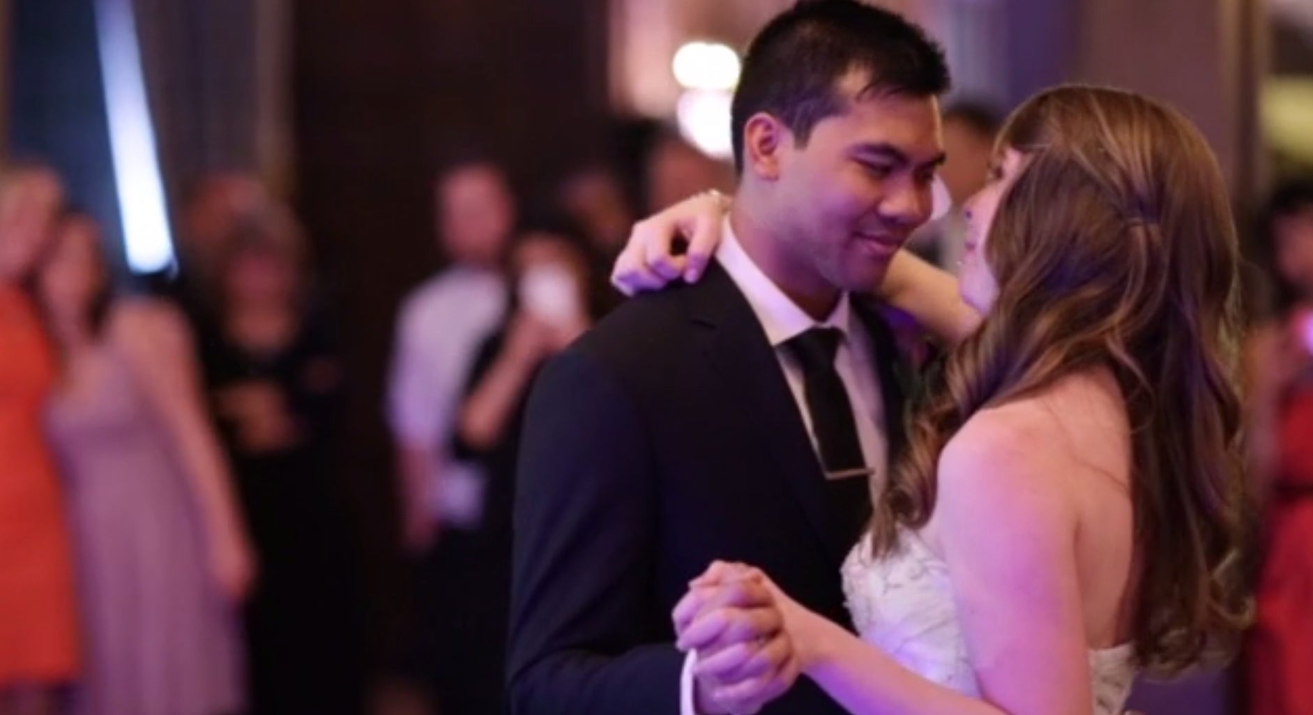 Solomon Chau and Jennifer Carter enjoy their first dance on their wedding day