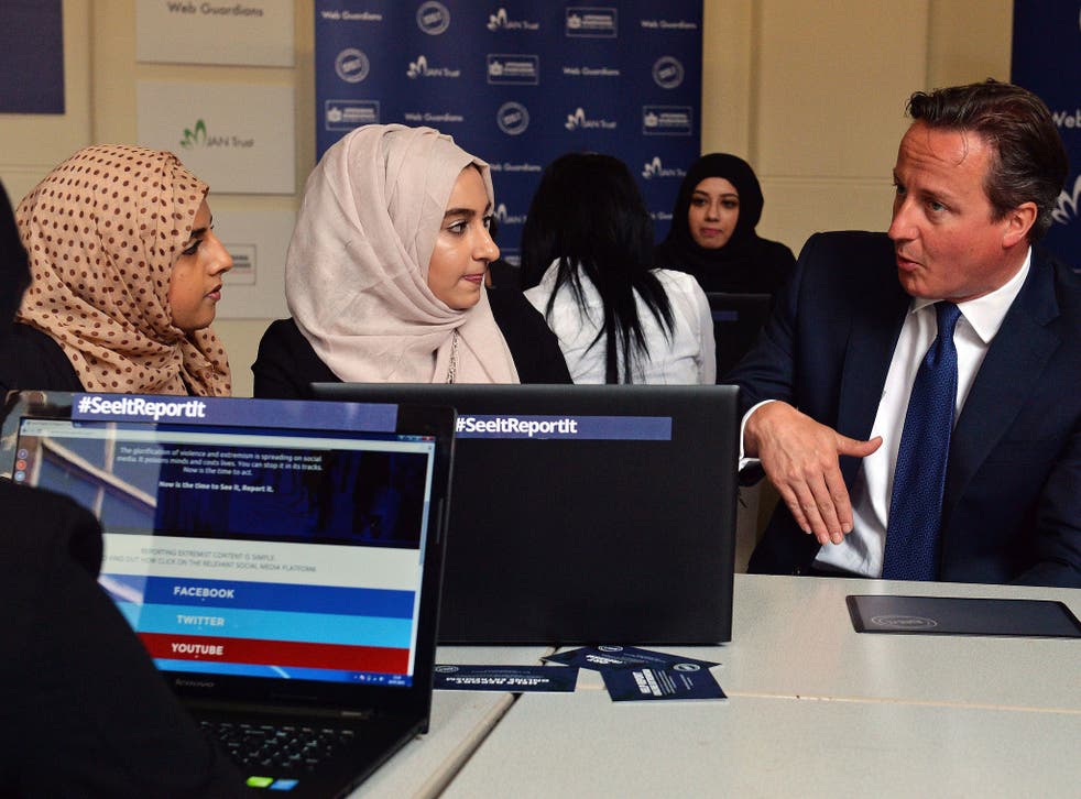 David Cameron speaks to students at a Birmingham school about ways that young Muslims can tackle extremism online