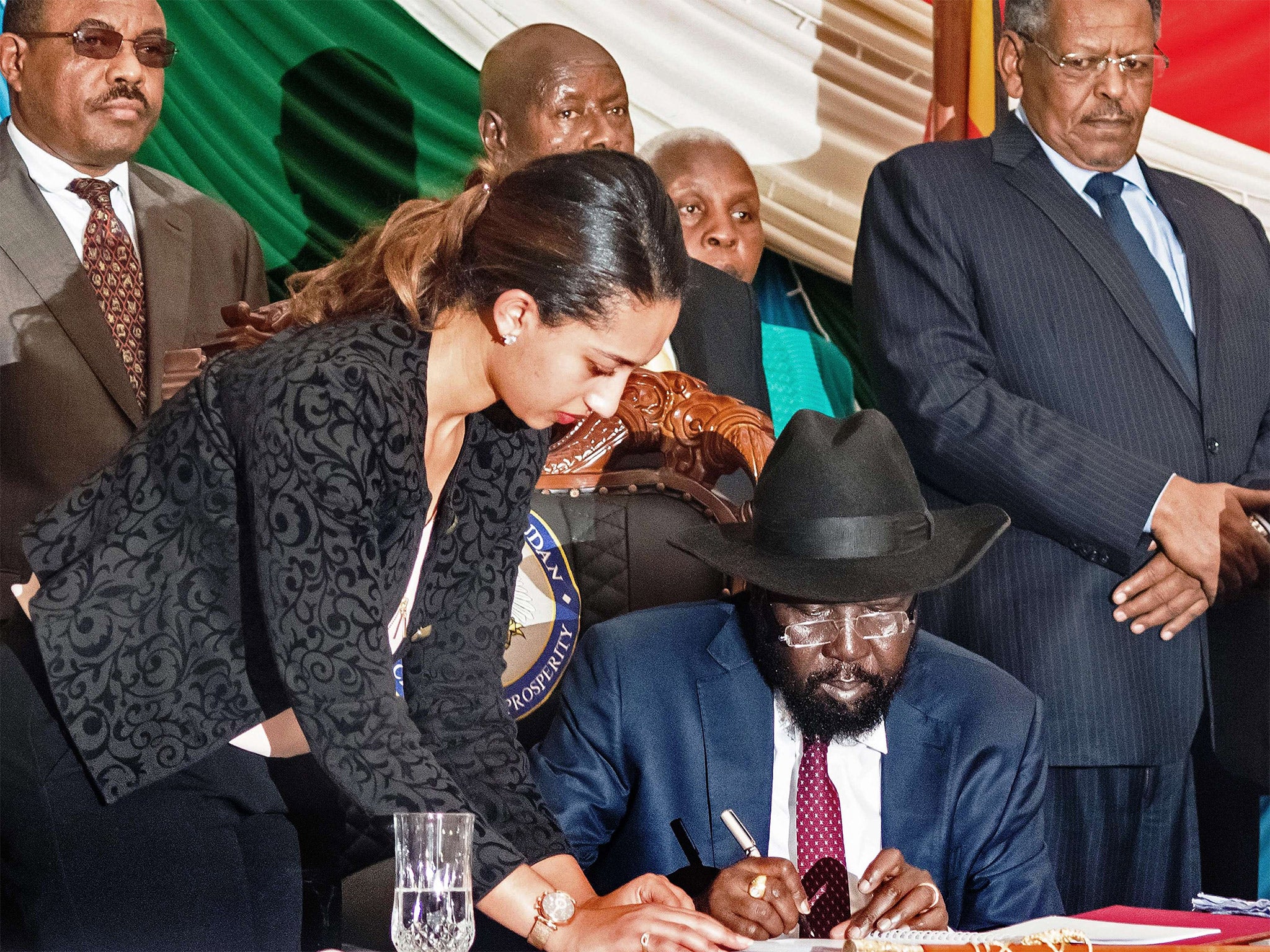 African leaders watch President Salva Kiir sign the accord