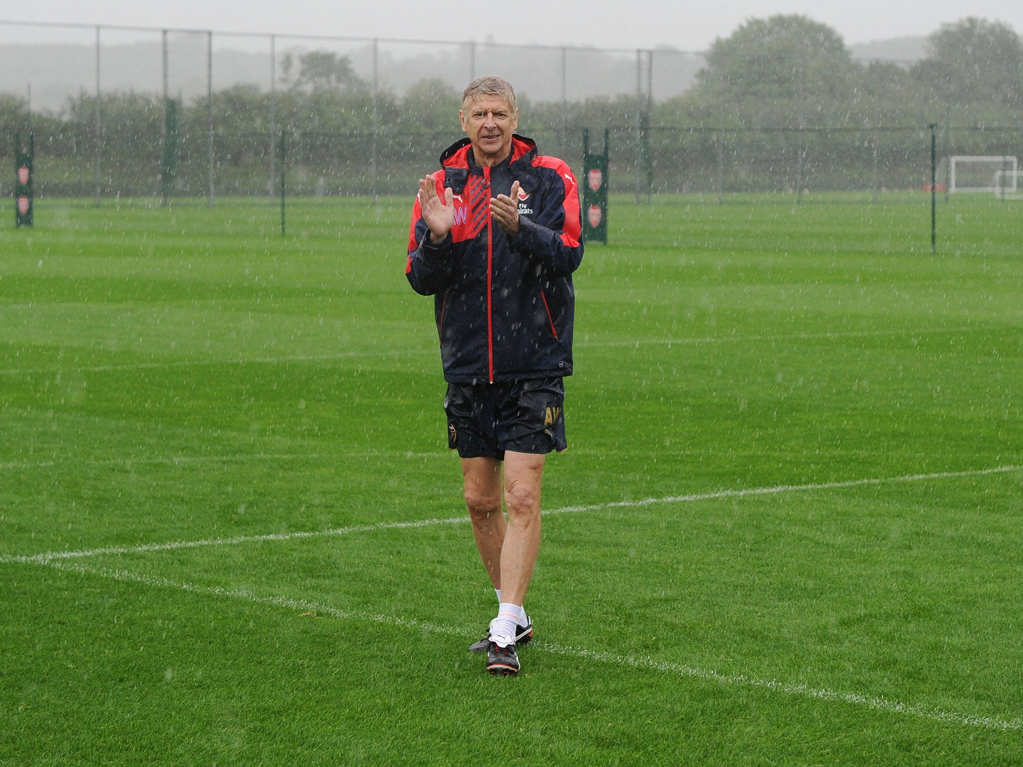 Arsene Wenger leads training at Arsenal's London Colney training base