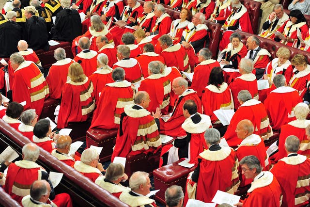Peers in their ceremonial ermine cloaks in the House of Lords