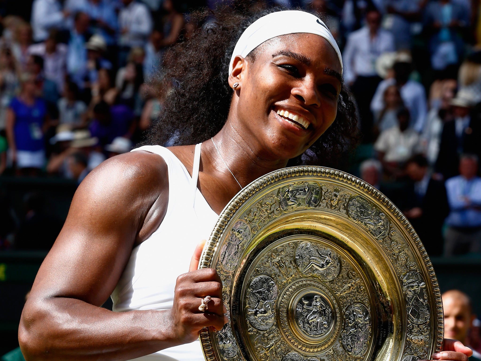 Serena Williams of the United States celebrates after degeating Garbine Muguruza in the 2015 Wimbledon final