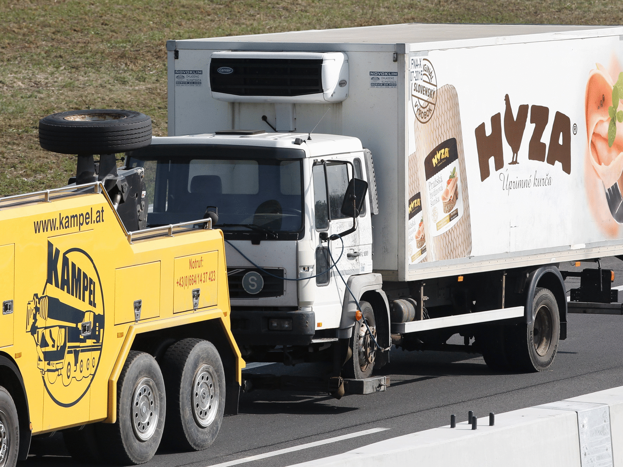 The truck is towed along a highway near Neusiedl am See, Austria