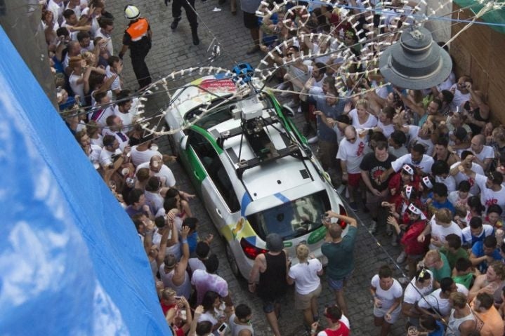 The Google Streetview car arrives at the festival before it was pelted
