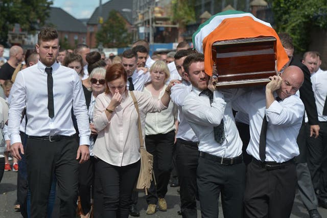 The funeral of the former IRA member Kevin McGuigan, who was shot outside his home earlier this month