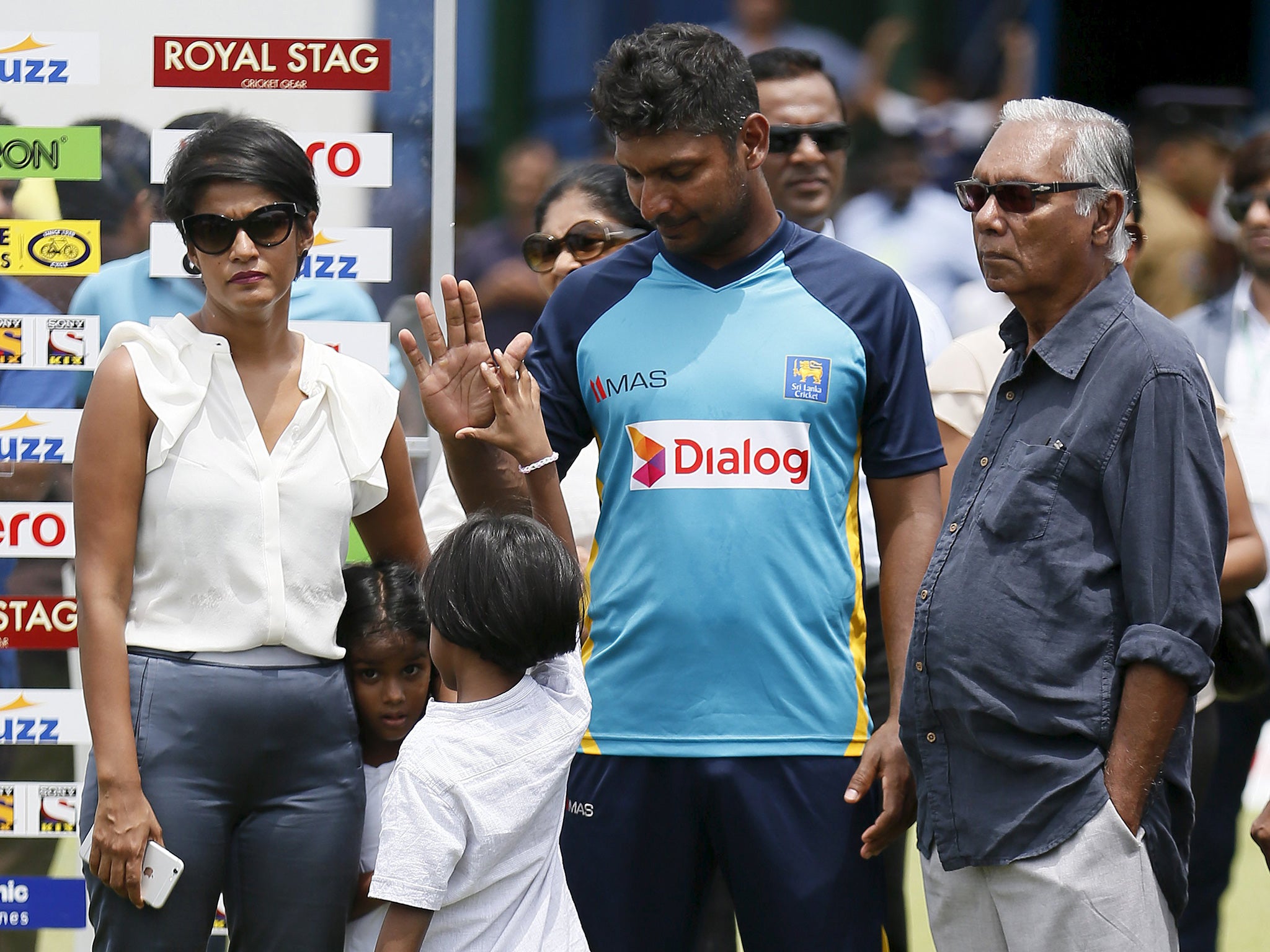 Kshema Sangakkara (right) and son Kumar after the latter’s final match for Sri Lanka