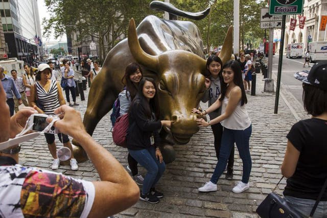 Wall Street’s Bull pulls the crowds, but investors should not confuse brains with a bull run