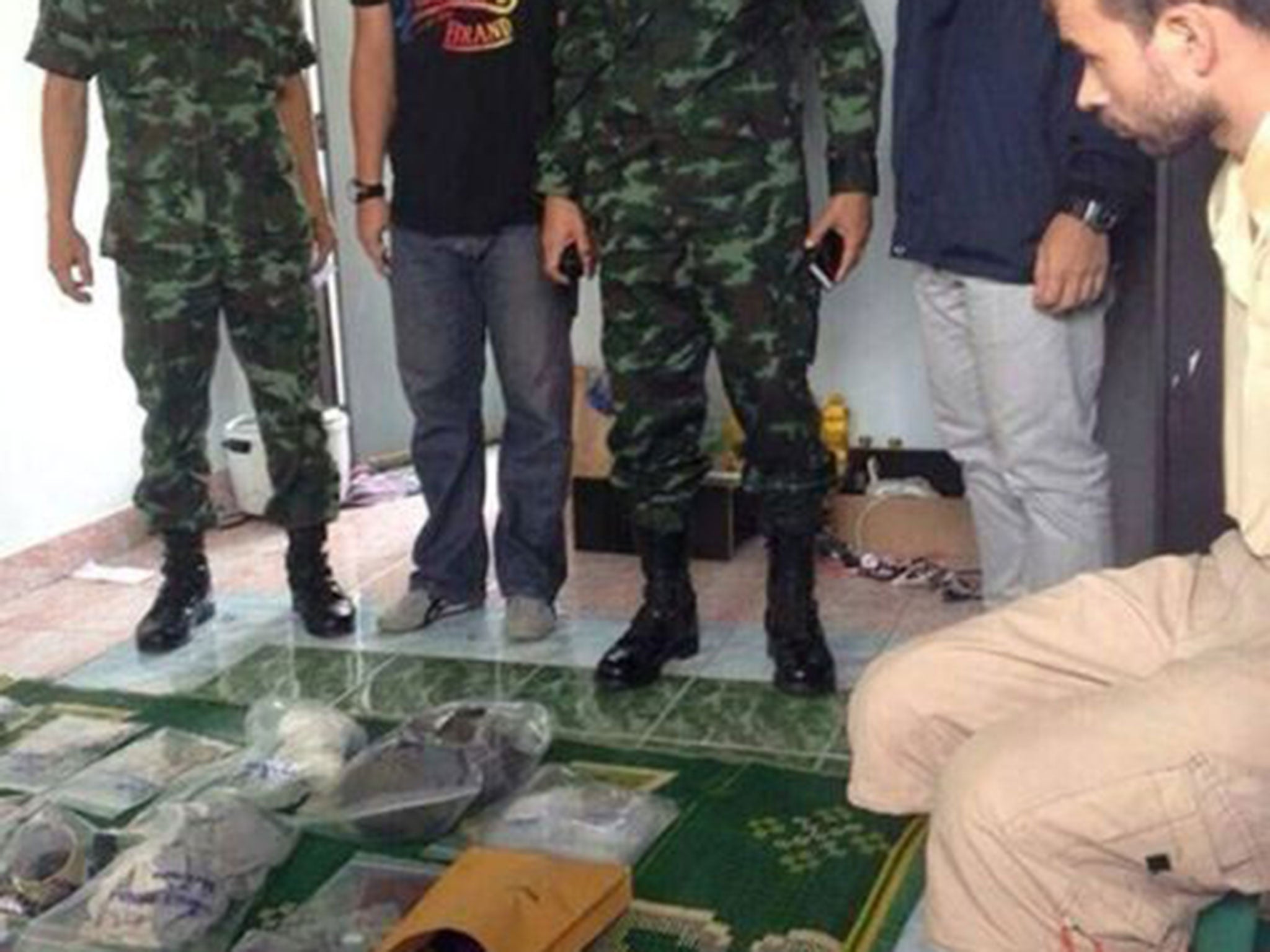 Thai police released an image of Adem Karadag alongside suspected bomb-making material which they say they found in his flat