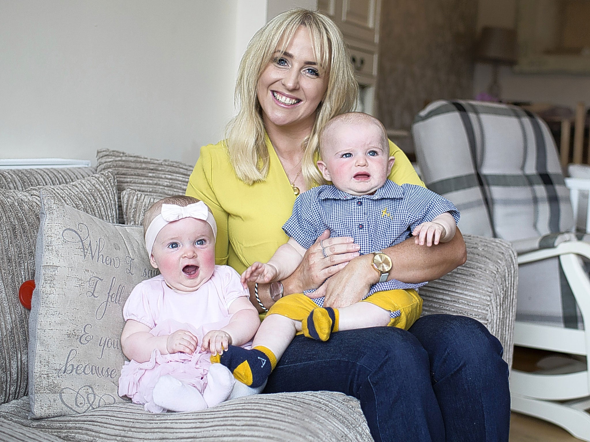 Lizzie Jones, widow of rugby league player Danny Jones, with children Phoebe and Bobby