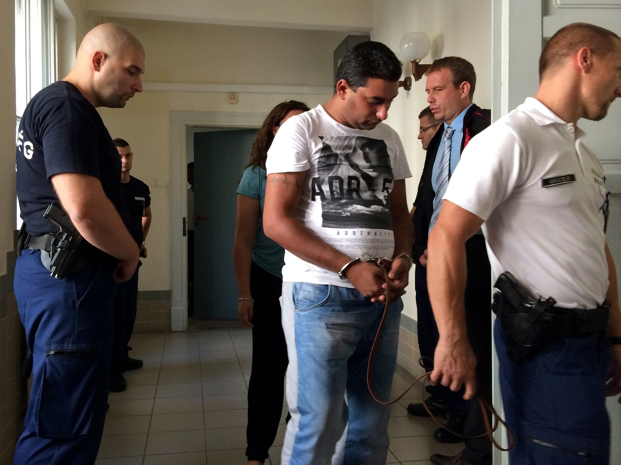 One of the suspects in court in Hungary over the deaths of 71 refugees