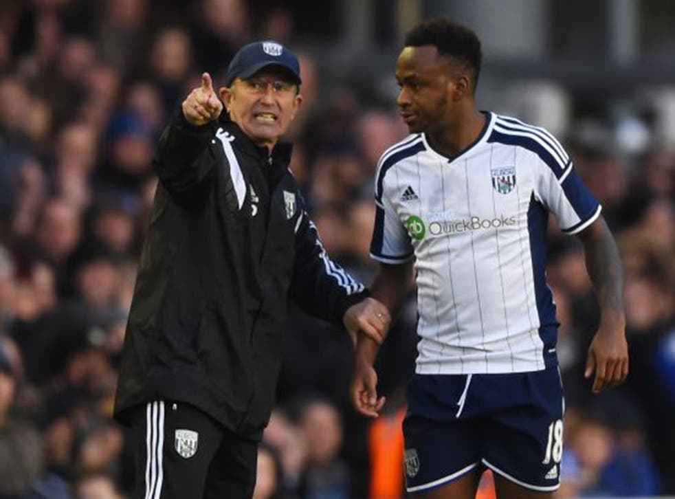 West Bromwich manager Tony Pulis with striker Saido Berahino, who the club insist is staying