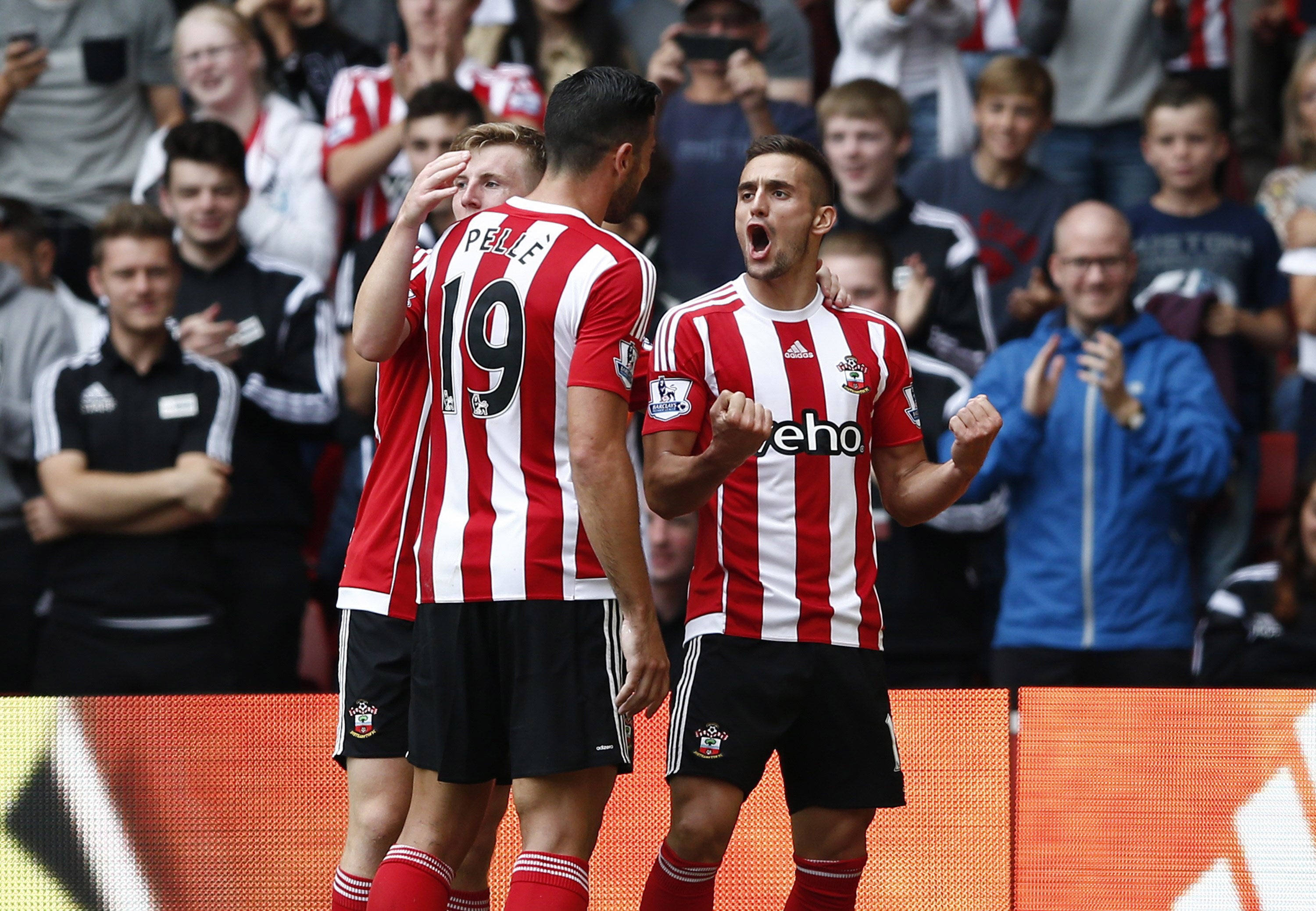 Dusan Tadic celebrates his first goal of the game