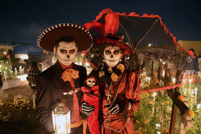 A couple celebrate Mexico’s Day of the Dead holiday